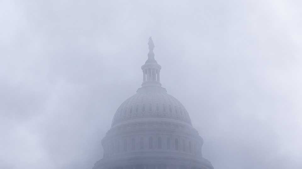 The U.S. Capitol on a foggy day