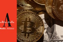 Image of bitcoins and dollar bills