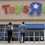 Two shoppers walk into a Toys "R" Us store