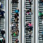 shoppers on an escalator