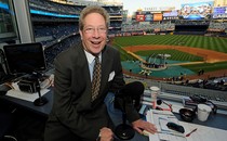 New York Yankees broadcaster John Sterling in his booth before game against the Boston Red Sox in 2009