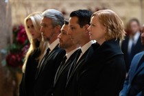 The Roy siblings in a line, all wearing black