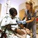 Nurse checks patient's vitals