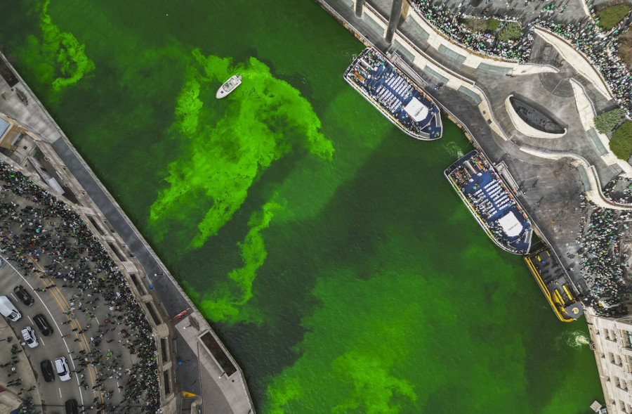 An aerial view of green dye being dumped into the Chicago River