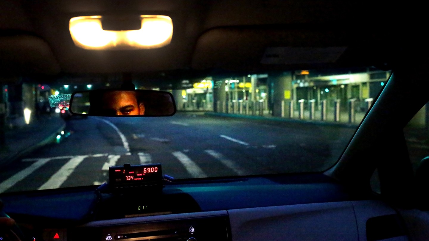 a photo of the front of a taxi cab
