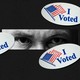 An illustration of "I Voted" stickers with a pair of eyes watching