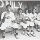 The Newark Eagles, a Negro-league baseball team, photographed in a dugout