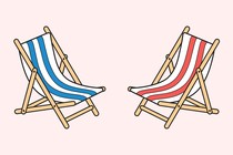 one red and one blue empty recliner deck chairs facing each other