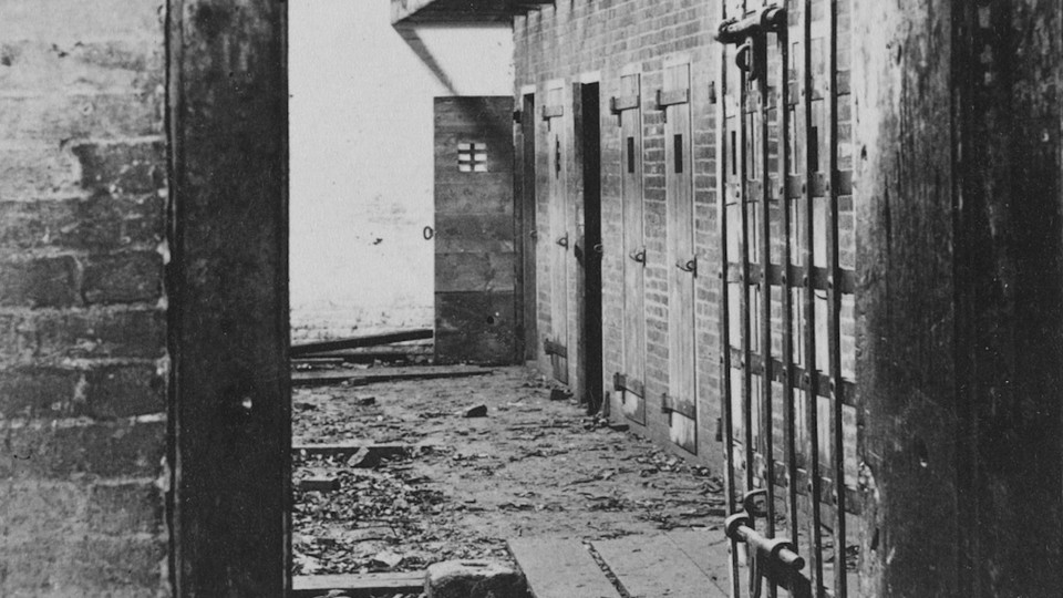 Interior view of a slave pen, showing the doors of cells where the slaves were held before being sold