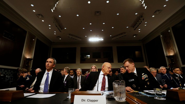 U.S. Defense Under Secretary for Intelligence Marcel Lettre, Director of National Intelligence James Clapper, and National Security Agency Director U.S. Navy Admiral Michael Rogers testify before a Senate Armed Services Committee hearing on foreign cyber threats.