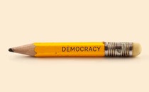 An illustration of a pencil that is engraved with the word "democracy"