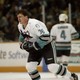 Todd Ewen skates with blood on his face, 1997