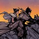 Catwoman and Batman riding on a horse