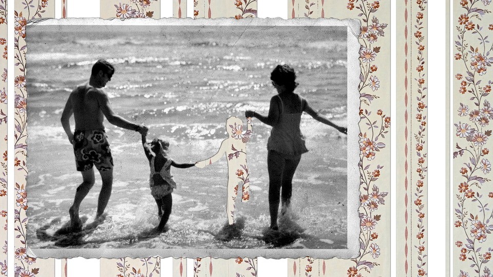 photo of a family with a cutout where one sibling should be