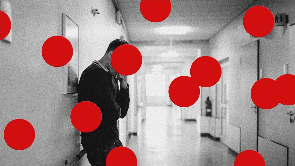 Photo of a person in a hospital hallway, overlaid with large red dots