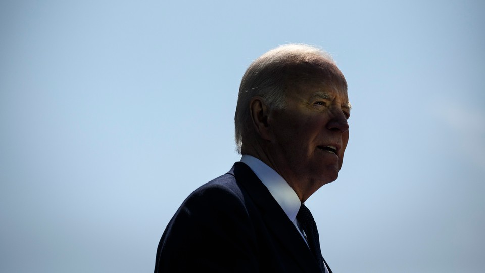 Photo of Joe Biden against a blue sky