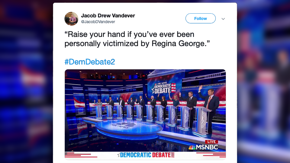 A tweet reading "Raise your hand if you've ever been personally victimized by Regina George" displays a photo of a group of 2020 Democratic presidential candidates all raising their hands.