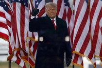 A photo of Donald Trump saluting a crowd of Stop the Steal supporters