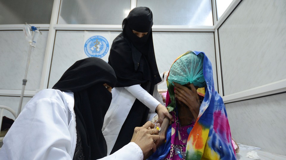 Nurses treat an 18-year-old woman for severe acute malnutrition in Hodeidah.