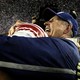 Tom Coughlin hugging a player after Super Bowl win