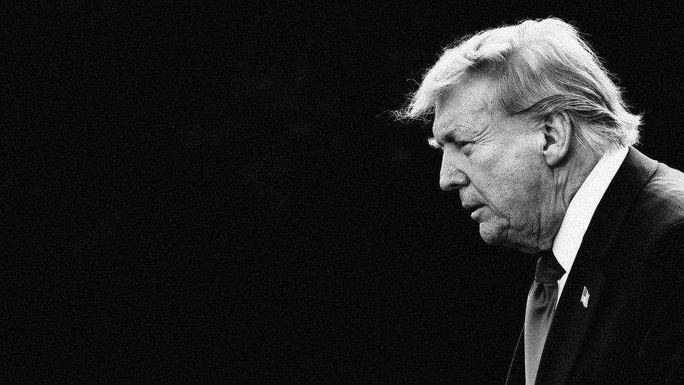 A black-and-white photo of Trump against a black background