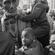 Children gather around a statue of Abraham Lincoln in Newark, New Jersey, on April 7, 1968.