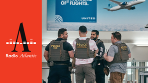 ICE agents stand guard at Newark Liberty International Airport.