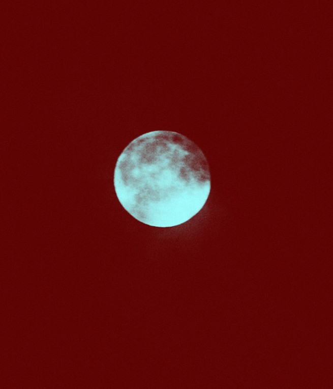 drawing of the moon against a red background