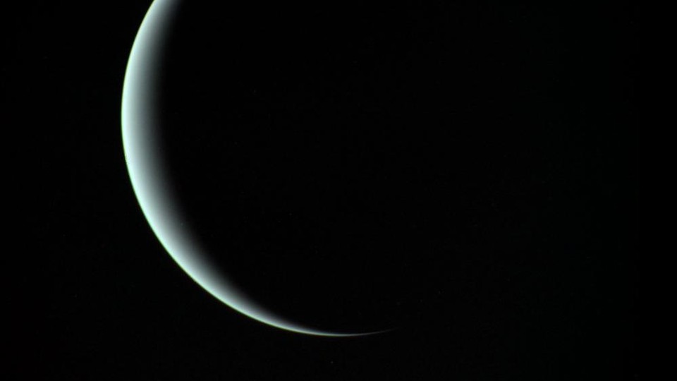 Uranus as seen by Voyager 2 on its way deeper into space