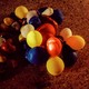 photo of a string of balloons partially or fully deflated