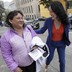 San Francisco mayoral candidate Jane Kim speaks with a constituent on the street. 