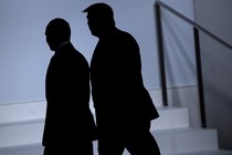 Russia's President Vladimir Putin and U.S. President Donald Trump arrive for a group photo at the G20 Summit in Osaka on June 28, 2019.