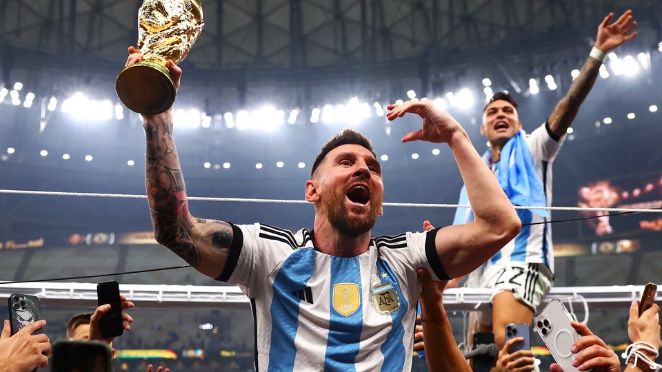 Lionel Messi celebrates his World Cup trophy following Argentina's win