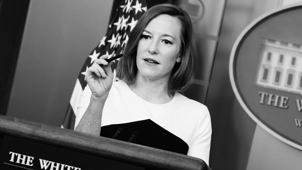 Jen Psaki speaking from a White House podium