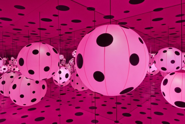 Creepy life-like robot of artist Yayoi Kusama spotted painting