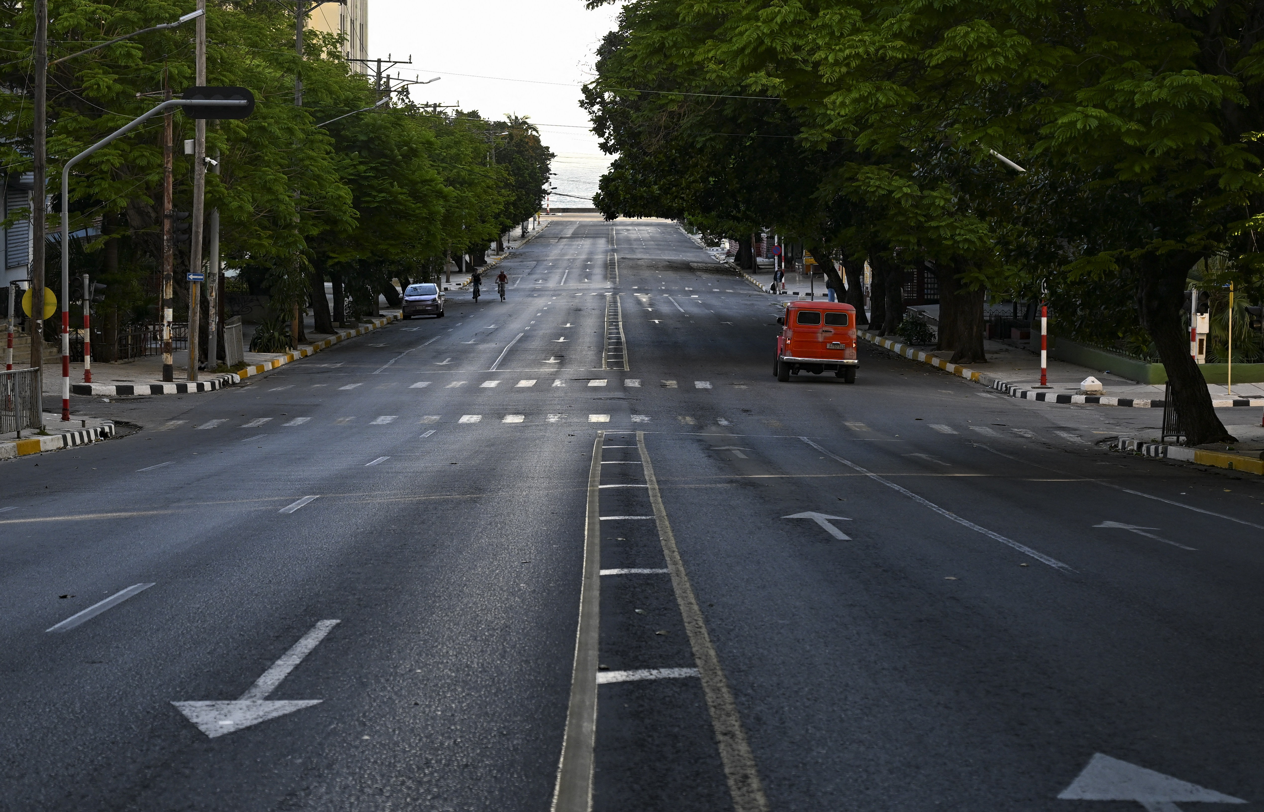 A view of an almost-empty street, seen during a blackout in Havana