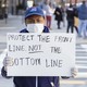 Grocery store workers protesting in Boston.