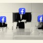 People sitting in a conference room, their faces covered by Facebook logos