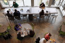 Students at the University of New Hampshire have lunch at a $17,000 custom-made, LED-light-equipped chef's table, which the university now acknowledges was an inappropriate purchase.