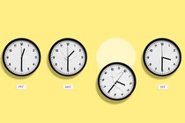 four clocks showing different time zones
