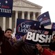 George W. Bush and Al Gore supporters hold signs outside the U.S. Supreme Court.