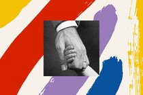Adult hand holding a child's hand