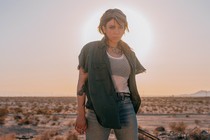 Alynda Segarra posing with desert in the background