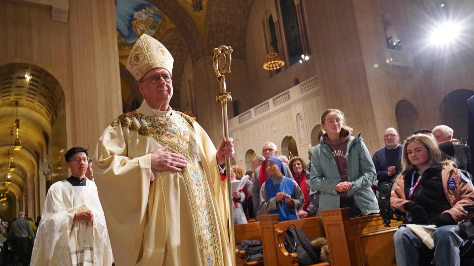 Archbishop Joseph Naumann processes through the Basilica of the National Shrine of the Immaculate Conception in Washington, D.C.