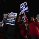 People holding UAW signs