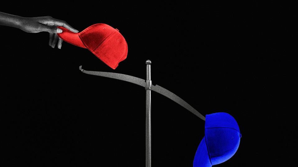 A hand placing a red hat on a scale