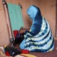 A woman weaving in Mali