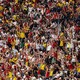Fans from different countries at a World Cup stadium