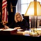 Photo of Liz Cheney at her desk in the U.S. Capitol in 2021