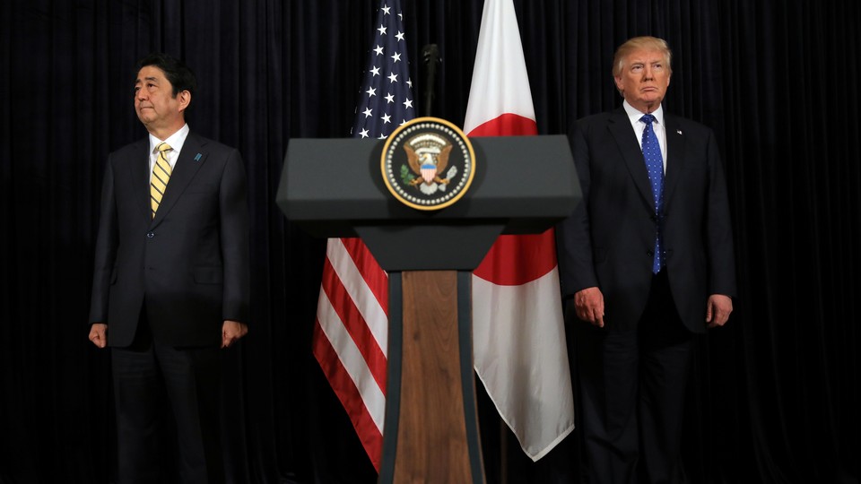 U.S. President Donald Trump and Japanese Prime Minister Shinzo Abe after delivering remarks on North Korea on February 11, 2017
